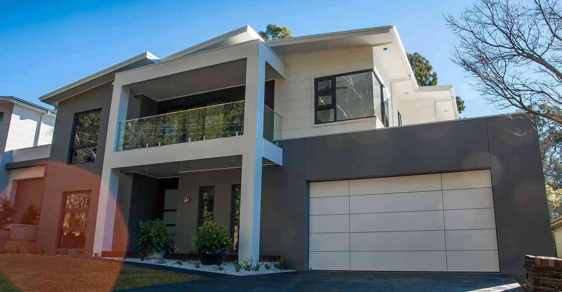Designer Garage Doors Installation in Brisbane & Gold Coast with Modern Sheer Panel Design