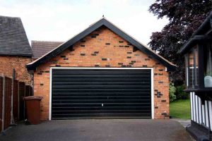 Modern Black Garage Door Installed on Residential Home in Brisbane and Gold Coast